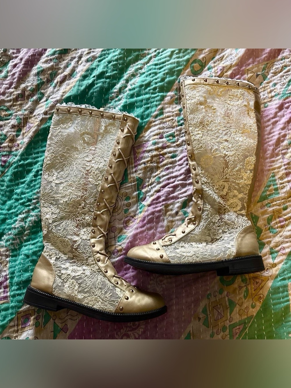 Medieval style gold lace boots